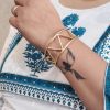 Handmade geometric cuff bangle with a trendy gold-plated finish, stylish and adjustable for women.