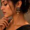 Elegant floral motif silver replica stud earrings with an oxidized finish, perfect for everyday wear.