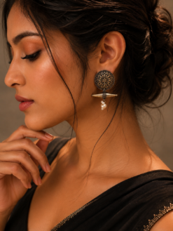 Elegant floral motif silver replica stud earrings with an oxidized finish, perfect for everyday wear.