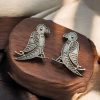 Oxidized Replica Parrot Design Stud Earrings with an elegant traditional jewelry finish, featuring intricate detailing and a vintage silver replica look for ethnic wear.
