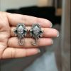 Handcrafted Silver Replica Oxidized Ganesh Stud Earrings for everyday wear, featuring intricate detailing and a spiritual touch.