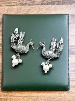 Elegant Ethnic Oxidized Peacock Stud Earrings with a silver look-alike design, featuring intricate detailing and a vintage charm for traditional and everyday wear.