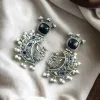 Handcrafted Silver Look-Alike Dancing Girl Earrings with Floral Moon, Monalisa Stone, and Pearl Detailing in an elegant oxidized finish.