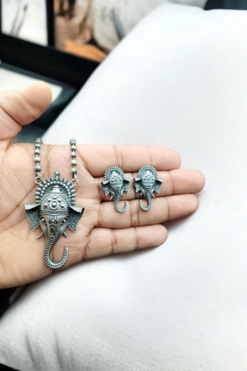Traditional Ganesha Necklace Set with Unique Oxidised Silver Look-Alike Finish and Matching Stud Earrings