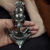 Handcrafted Silver Plated Ganesha Pendant Necklace with Floral Design and Long Ghoongroo Chain for Festive Wear.