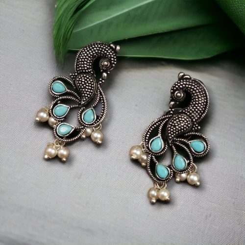 Oxidized lightweight peacock stud earrings with intricate pearl and stone detailing.