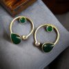 Elegant lightweight golden stone stud earrings in a unique Western style with a premium gold plated finish.