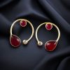 Elegant lightweight golden stone stud earrings in a unique Western style with a premium gold plated finish.