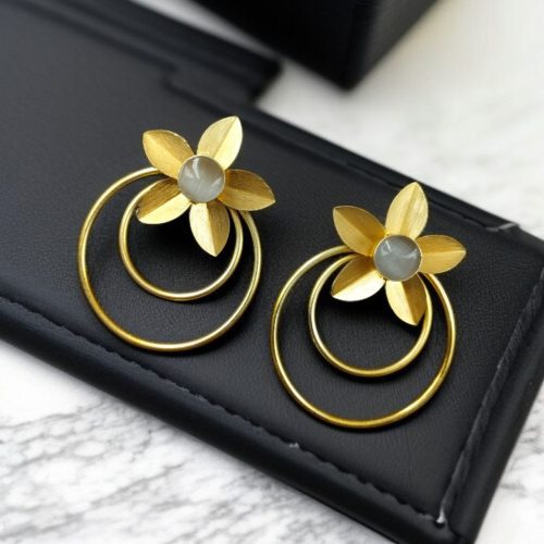 Elegant gold-plated half-circle flower earrings with floral and leaf design, adorned with sparkling stones for a stylish and contemporary look.