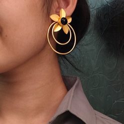 Elegant gold-plated half-circle flower earrings with floral and leaf design, adorned with sparkling stones for a stylish and contemporary look.
