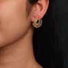 Modern gold-plated half-circle stone earrings with sparkling stones, featuring a stylish and contemporary design for an elegant look.