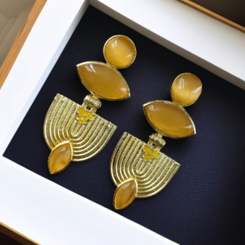 Elegant gold-plated stone earrings with a unique Western-style design, perfect for party wear and special occasions.
