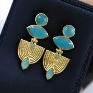 Elegant gold-plated stone earrings with a unique Western-style design, perfect for party wear and special occasions.