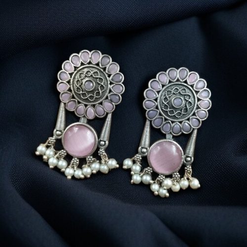Handcrafted silver look earrings with Monalisa stone and pearl accents in a beautiful floral design, perfect for casual and festive wear.