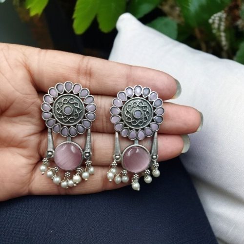 Handcrafted silver look earrings with Monalisa stone and pearl accents in a beautiful floral design, perfect for casual and festive wear.