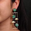 Traditional Indian wedding earrings, gold-plated and handmade with stunning stone accents, perfect for bridal and festive wear.