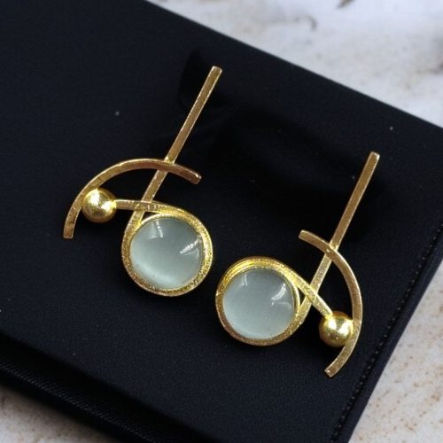 Elegant gold-plated Monalisa stone stud golden earrings for party wear.