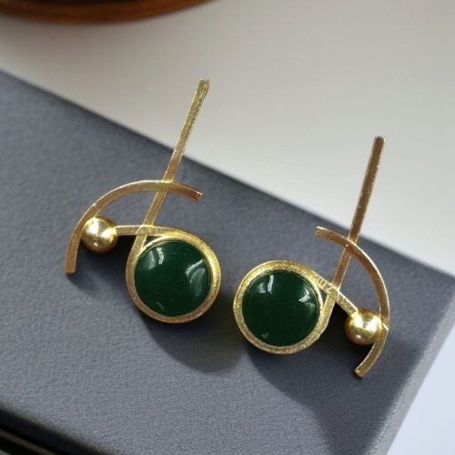 Elegant gold-plated Monalisa stone stud golden earrings for party wear.