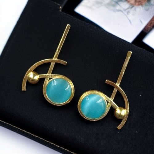 Elegant gold-plated Monalisa stone stud golden earrings for party wear.
