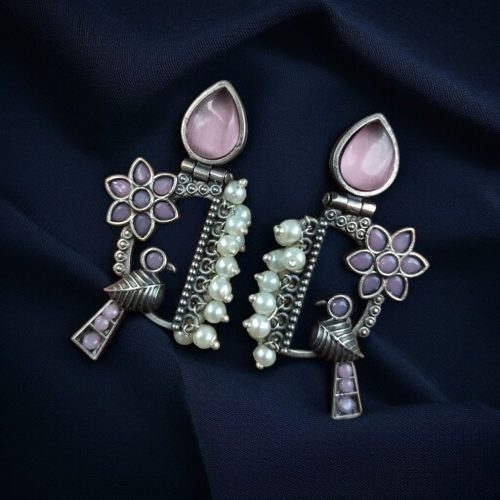 Traditional bird design oxidized silver replica bird earrings with pearl and stone work.