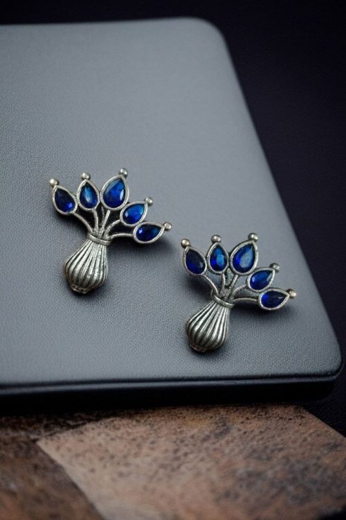 Elegant silver flower pot earrings with a stone for daily wear.