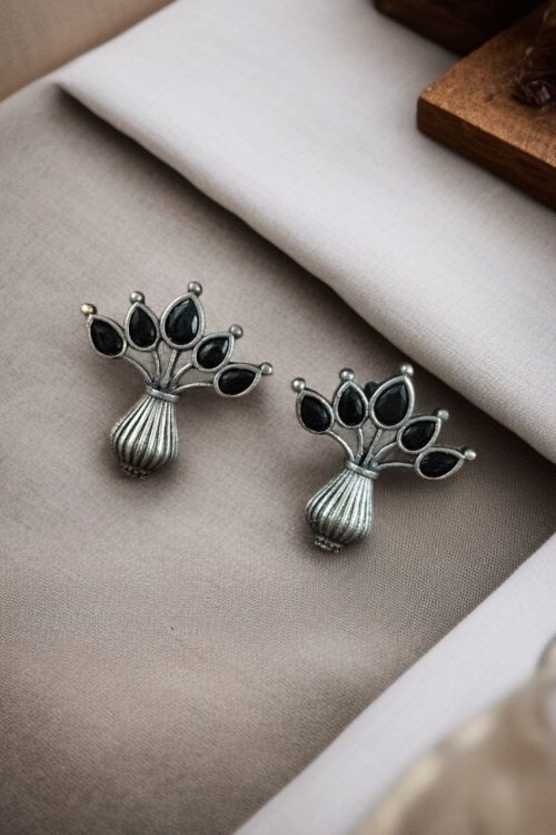 Elegant silver flower pot earrings with a stone for daily wear.