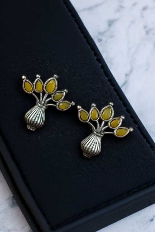 Elegant silver flower pot earrings with a stone for daily wear.