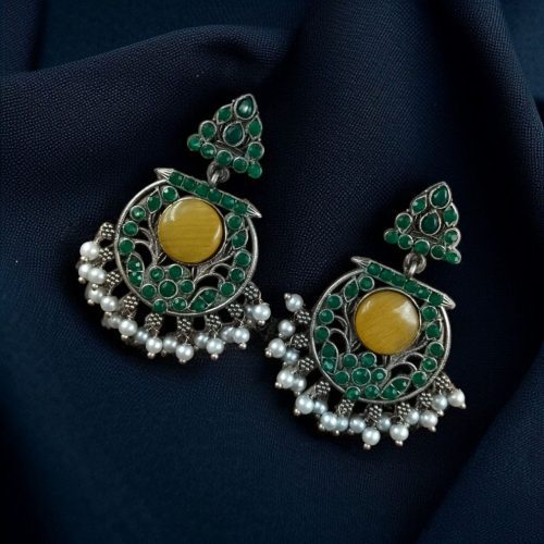 Designer floral earrings with silver replica finish, dangler stud style, and intricate stone detailing.