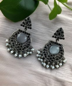 Designer floral earrings with silver replica finish, dangler stud style, and intricate stone detailing.