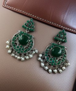 Designer floral earrings with silver replica finish, dangler stud style, and intricate stone detailing.