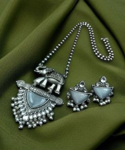 Traditional oxidised elephant necklace set with Monalisa stone and pearl beads in antique silver finish.