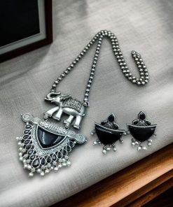 Traditional oxidised elephant necklace set with Monalisa stone and pearl beads in antique silver finish.