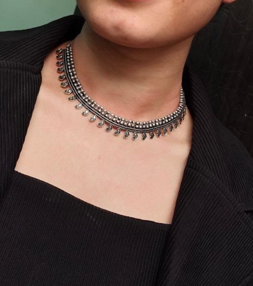 Handcrafted Oxidized Silver Choker Necklace with intricate detailing and vintage charm.