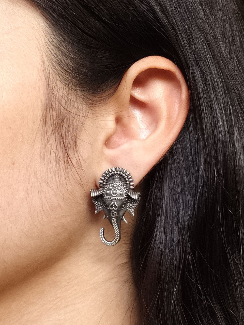 Silver Replica Oxidized Ganesh Stud Earrings Best for Everyday Wear 1 Handcrafted Silver Replica Oxidized Ganesh Stud Earrings for everyday wear, featuring intricate detailing and a spiritual touch.