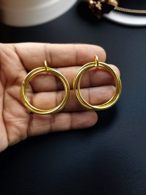 Gold plated geometric stud earrings for modern fashion lovers.