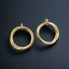 Gold plated geometric stud earrings for modern fashion lovers.