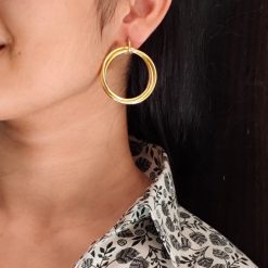 Gold plated geometric stud earrings for modern fashion lovers.