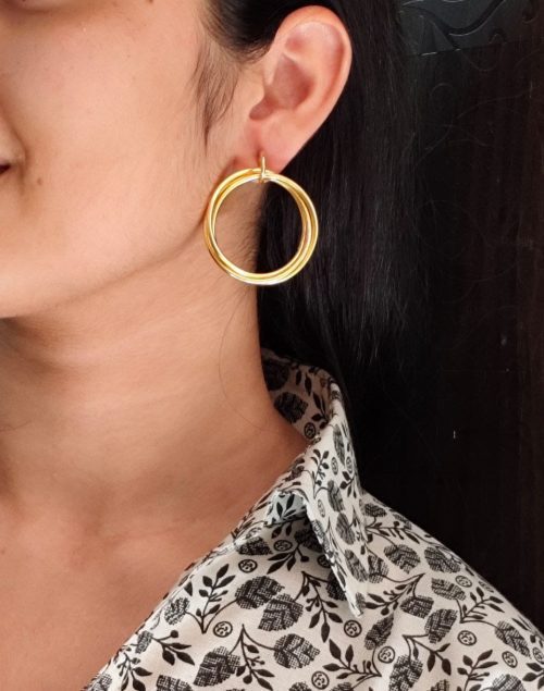 Gold plated geometric stud earrings for modern fashion lovers.