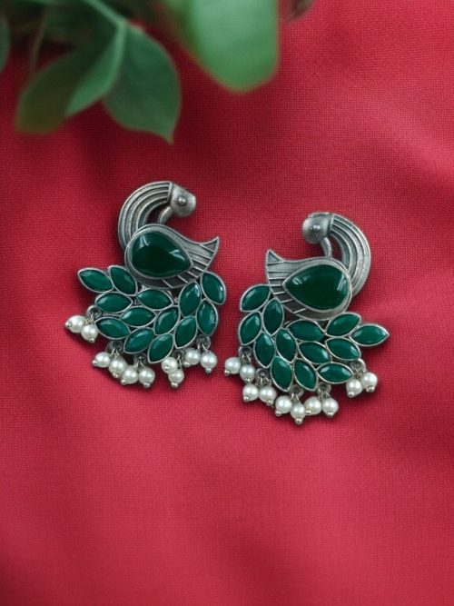 Oxidized peacock earrings with Monalisa stone and pearl drops.