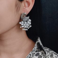 Oxidized peacock earrings with Monalisa stone and pearl drops.