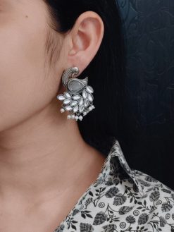 Oxidized peacock earrings with Monalisa stone and pearl drops.