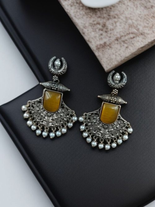 Oxidized half moon earrings with floral design, pearl, and Monalisa stone.