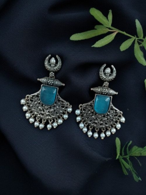 Oxidized half moon earrings with floral design, pearl, and Monalisa stone.