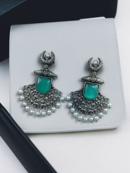 Oxidized half moon earrings with floral design, pearl, and Monalisa stone.