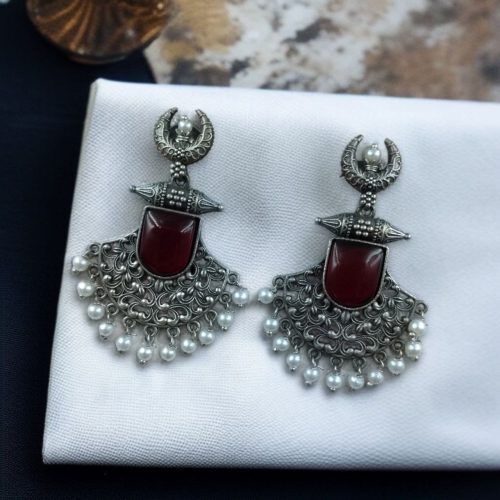 Oxidized half moon earrings with floral design, pearl, and Monalisa stone.