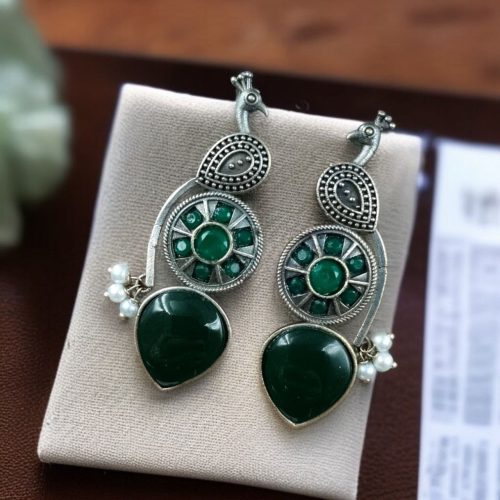 Oxidized silver peacock earrings with Monalisa stone and pearl drops.