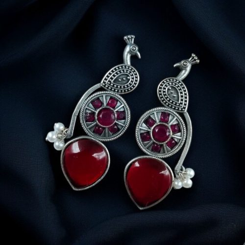 Oxidized silver peacock earrings with Monalisa stone and pearl drops.