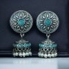 Oxidized silver jhumki earrings with stone and pearl detailing