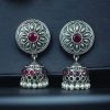 Oxidized silver jhumki earrings with stone and pearl detailing