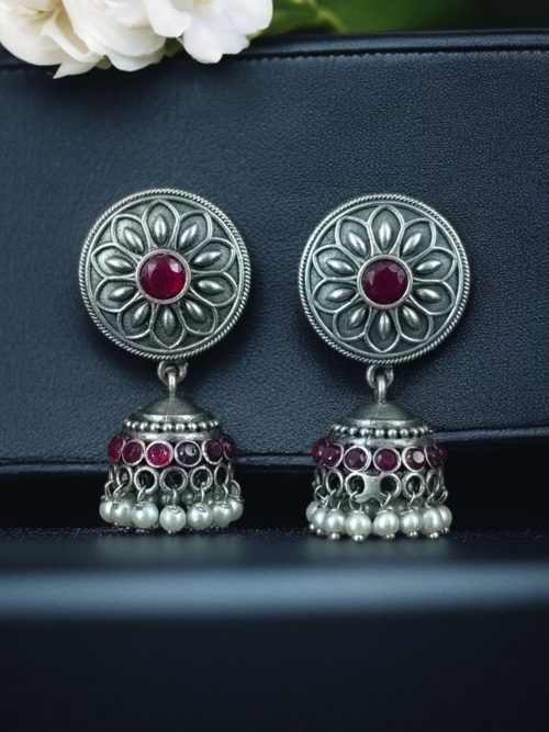 Oxidized silver jhumki earrings with stone and pearl detailing